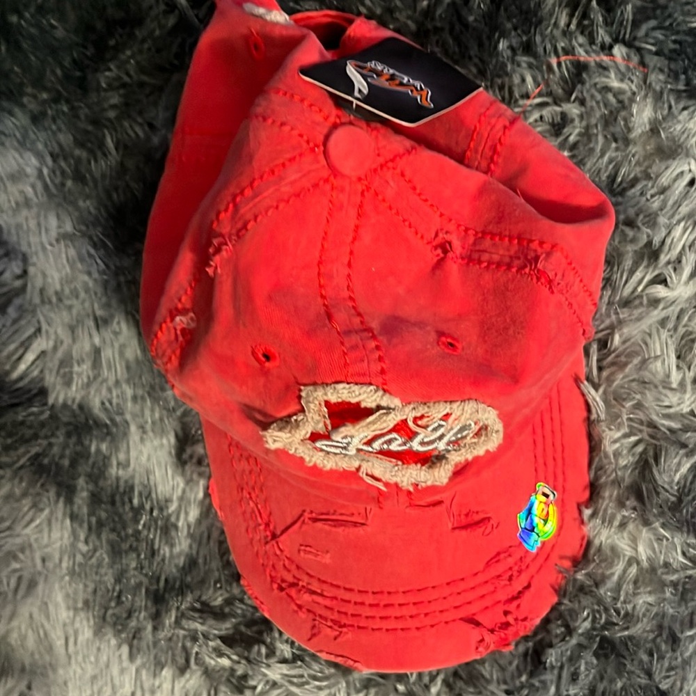 NWT New “Wild Wear ‘Y’all’ ” Texas themed, distressed looking red hat.Adult1size